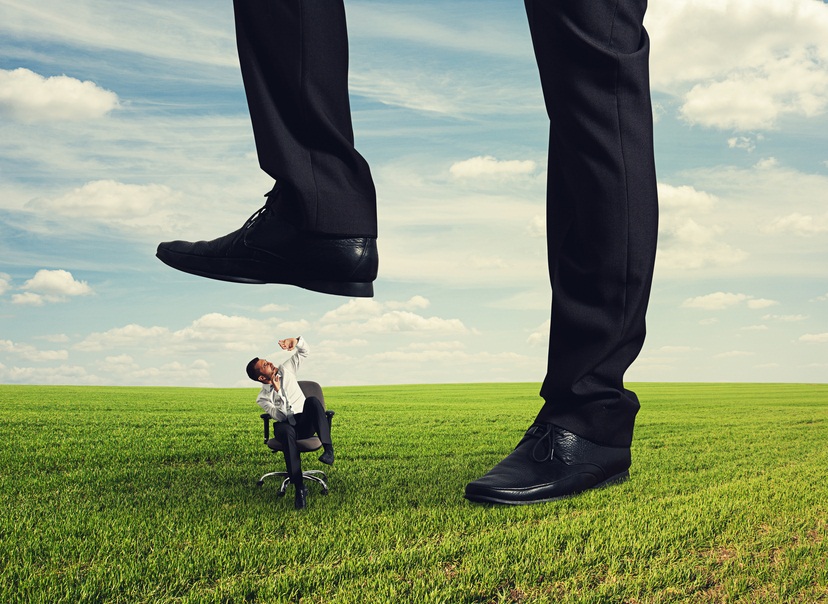 boss trampling down bad worker in the land